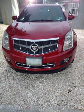 foto Cadillac SRX Premium AWD usado (2015) color Rojo precio $365,000