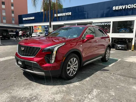 Cadillac XT4 2.0L usado (2019) color Rojo financiado en mensualidades(enganche $128,750 mensualidades desde $12,553)