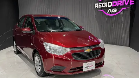 Chevrolet Aveo LS usado (2023) color Rojo Cerezo financiado en mensualidades(enganche $47,980 mensualidades desde $5,753)