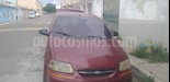 foto Chevrolet Aveo 1.6L usado (2005) color Rojo precio Bs.1.600