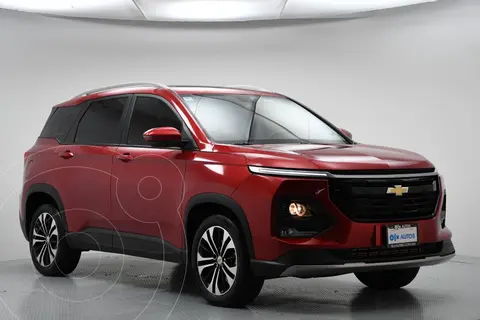 Chevrolet Captiva Premier usado (2023) color Rojo financiado en mensualidades(enganche $116,750 mensualidades desde $6,947)