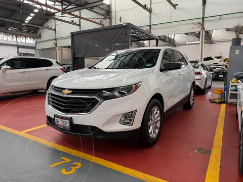 Chevrolet Equinox LS usado (2020) color Blanco financiado en mensualidades(enganche $70,000 mensualidades desde $6,400)