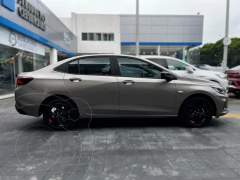 Chevrolet Onix Premier Red Line Aut usado (2023) color Dorado financiado en mensualidades(enganche $86,670 mensualidades desde $5,775)