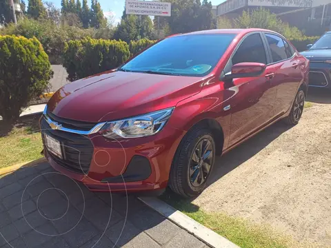 Chevrolet Onix LS usado (2024) color Rojo financiado en mensualidades(enganche $81,060 mensualidades desde $6,569)