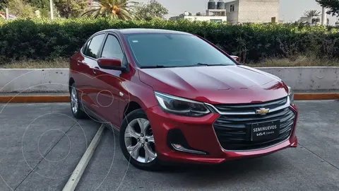 Chevrolet Onix Premier Aut usado (2022) color Rojo financiado en mensualidades(enganche $54,674 mensualidades desde $6,291)