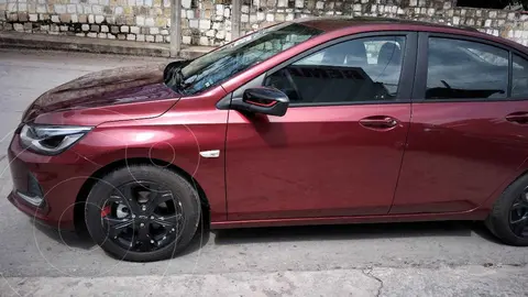 Chevrolet Onix Premier Red Line Aut usado (2024) color Rojo financiado en mensualidades(enganche $81,760 mensualidades desde $9,320)