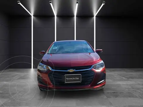 Chevrolet Onix LS usado (2023) color Rojo financiado en mensualidades(enganche $56,202 mensualidades desde $6,406)