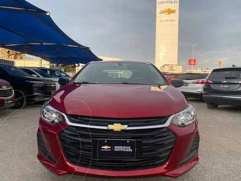 Chevrolet Onix LS Aut usado (2021) color Rojo financiado en mensualidades(enganche $55,000 mensualidades desde $7,910)