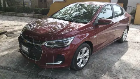 Chevrolet Onix LS Aut usado (2024) color Rojo financiado en mensualidades(enganche $64,960 mensualidades desde $7,405)