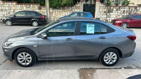 Chevrolet Onix LT usado (2022) color Plata financiado en mensualidades(enganche $64,960 mensualidades desde $7,405)