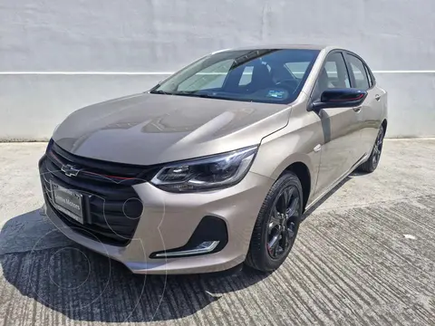 Chevrolet Onix Premier Red Line Aut usado (2023) color Dorado financiado en mensualidades(enganche $127,588 mensualidades desde $8,288)