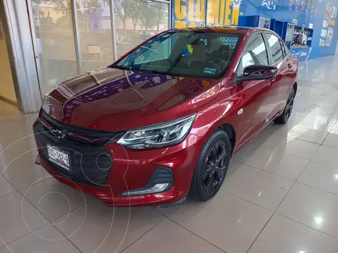 Chevrolet Onix Premier Red Line Aut usado (2023) color Rojo Cobrizo financiado en mensualidades(enganche $89,460 mensualidades desde $7,250)