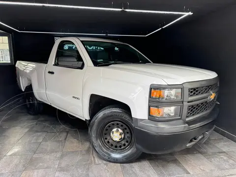 Chevrolet Silverado 4x4 Cab Reg LS usado (2015) color Blanco Olimpico financiado en mensualidades(enganche $50,000 mensualidades desde $70,000)