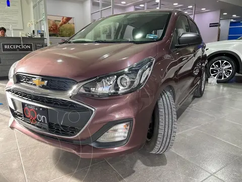 Chevrolet Spark LT usado (2020) color violeta oscuro financiado en mensualidades(enganche $60,000 mensualidades desde $3,480)