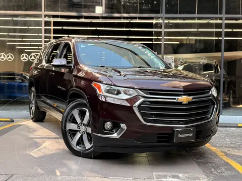 Chevrolet Traverse LT 7 Pasajeros usado (2019) color violeta oscuro financiado en mensualidades(enganche $165,110 mensualidades desde $7,093)