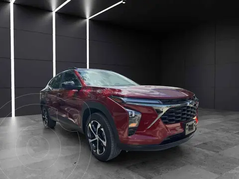 Chevrolet Trax RS usado (2025) color Rojo financiado en mensualidades(enganche $117,600 mensualidades desde $13,405)