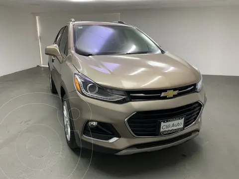 Chevrolet Trax Premier Aut usado (2018) color Naranja financiado en mensualidades(enganche $69,000 mensualidades desde $8,800)