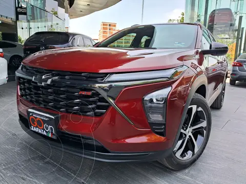 Chevrolet Trax RS usado (2024) color Rojo financiado en mensualidades(enganche $143,062 mensualidades desde $10,940)