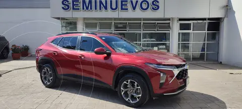 Chevrolet Trax LT usado (2024) color Rojo financiado en mensualidades(enganche $111,589 mensualidades desde $9,253)