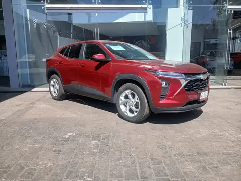 Chevrolet Trax LS usado (2024) color Rojo financiado en mensualidades(enganche $167,200 mensualidades desde $7,035)