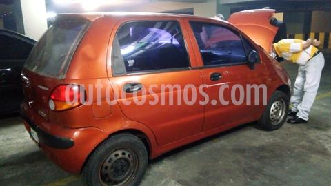 foto Daewoo Matiz S usado (2000) color Naranja precio Bs.1.100