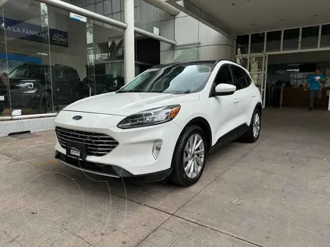 Ford Escape Hibrida Titanium usado (2021) color Blanco financiado en mensualidades(enganche $133,703 mensualidades desde $14,228)