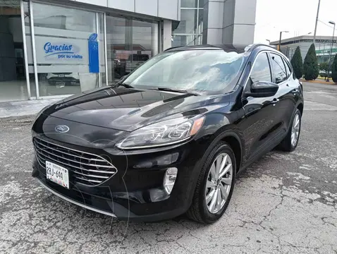 Ford Escape Hibrida Titanium usado (2022) color Negro financiado en mensualidades(enganche $105,280 mensualidades desde $11,486)