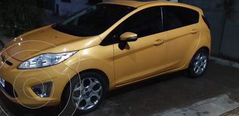 foto Ford Fiesta Kinetic Titanium usado (2011) color Amarillo Perlado precio $911.000