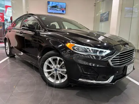 Ford Fusion SE LUX Hibrido usado (2018) color Negro precio $319,480