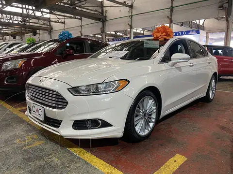 Ford Fusion SE Luxury usado (2014) color Blanco Platinado financiado en mensualidades(enganche $53,850 mensualidades desde $5,744)
