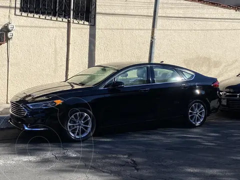 Ford Fusion SEL Hibrido usado (2020) color Negro Profundo precio $300,000