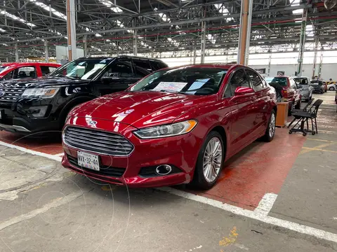 Ford Fusion SE Luxury Plus usado (2015) color Rojo Rubi financiado en mensualidades(enganche $40,000 mensualidades desde $3,700)