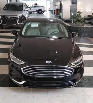 Ford Fusion 4 PTS. SE LUXURY HIBRIDO, 2.0L, TA, PIEL, QC, GPS usado (2020) color Negro precio $295,000