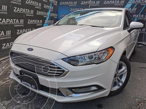 Ford Fusion SE Hibrido usado (2018) color Blanco Oxford financiado en mensualidades(enganche $133,000 mensualidades desde $7,000)