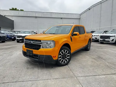 Ford Maverick Lariat usado (2022) color Amarillo financiado en mensualidades(enganche $116,380 mensualidades desde $13,066)