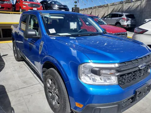 Ford Maverick XLT usado (2022) color Azul Electrico financiado en mensualidades(enganche $120,600 mensualidades desde $16,305)