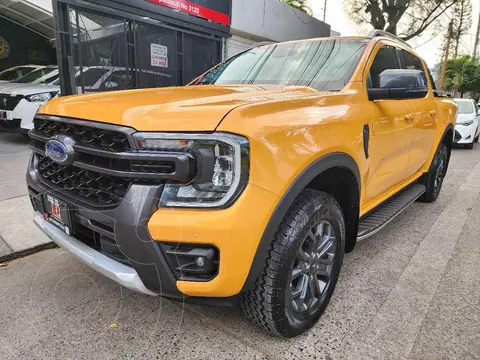 Ford Ranger Wildtrak Gasolina 4x4 usado (2023) color Amarillo financiado en mensualidades(enganche $730,218 mensualidades desde $45,397)