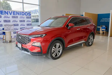 Ford Territory Titanium usado (2024) color Rojo Aden financiado en mensualidades(enganche $130,455 mensualidades desde $10,675)