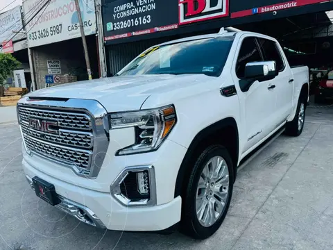 GMC Sierra Denali usado (2021) color Blanco financiado en mensualidades(enganche $342,868 mensualidades desde $21,316)