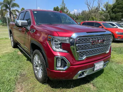 GMC Sierra Denali usado (2020) color Rojo financiado en mensualidades(enganche $282,188 mensualidades desde $23,827)