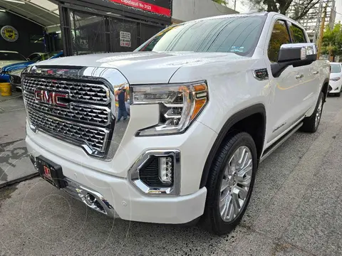 GMC Sierra Denali usado (2021) color Blanco financiado en mensualidades(enganche $342,868 mensualidades desde $21,316)