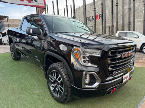 GMC Sierra AT4 usado (2021) color Negro financiado en mensualidades(enganche $310,000 mensualidades desde $18,845)