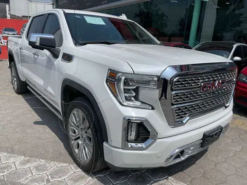 GMC Sierra Denali usado (2021) color Blanco financiado en mensualidades(enganche $282,188 mensualidades desde $23,827)