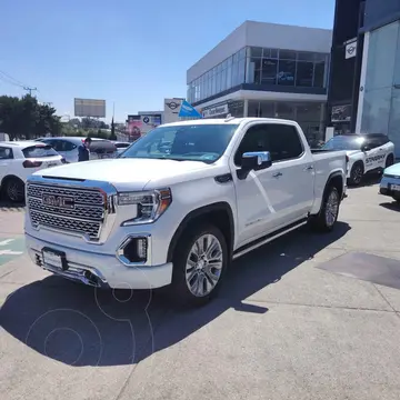 GMC Sierra Denali usado (2021) color Blanco financiado en mensualidades(enganche $217,799 mensualidades desde $24,702)