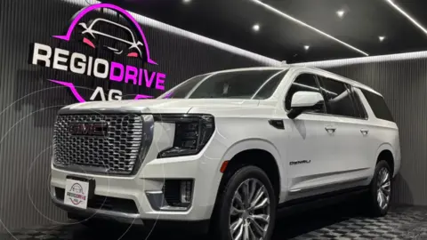 GMC Yukon Denali usado (2023) color Blanco financiado en mensualidades(enganche $849,950 mensualidades desde $23,992)