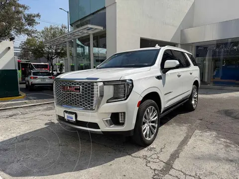 GMC Yukon Denali usado (2023) color Blanco financiado en mensualidades(enganche $433,225 mensualidades desde $46,101)