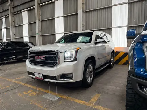 GMC Yukon Denali AWD usado (2016) color Blanco Diamante financiado en mensualidades(enganche $86,500 mensualidades desde $7,800)