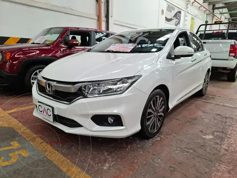 Honda City EX 1.5L Aut usado (2020) color Blanco financiado en mensualidades(enganche $62,000 mensualidades desde $5,400)