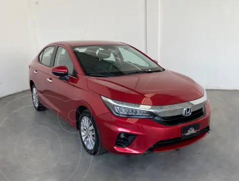 Honda City Touring usado (2023) color Rojo financiado en mensualidades(enganche $93,794 mensualidades desde $7,231)