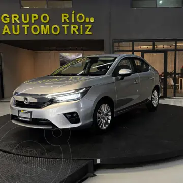 Honda City Touring usado (2022) color plateado financiado en mensualidades(enganche $38,588 mensualidades desde $8,136)